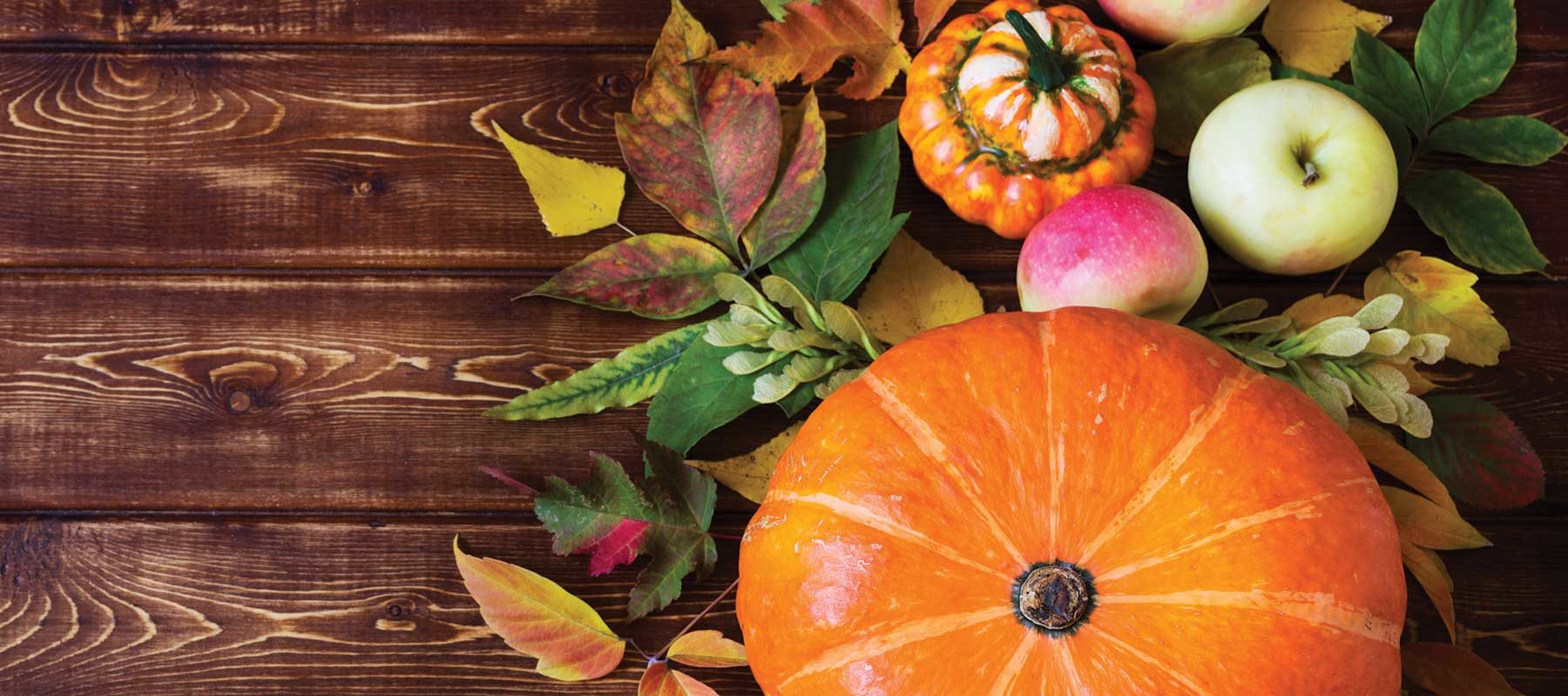 Rustic fall decor with pumpkin, apples