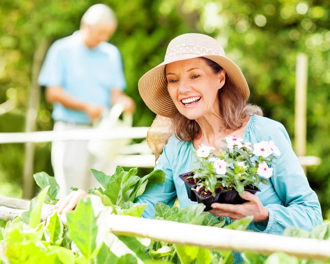 Retired woman gardening
