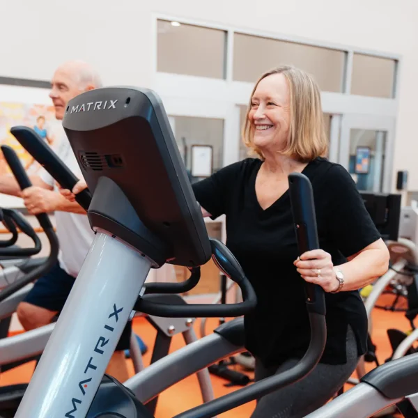 A standing stationary glider workout machine