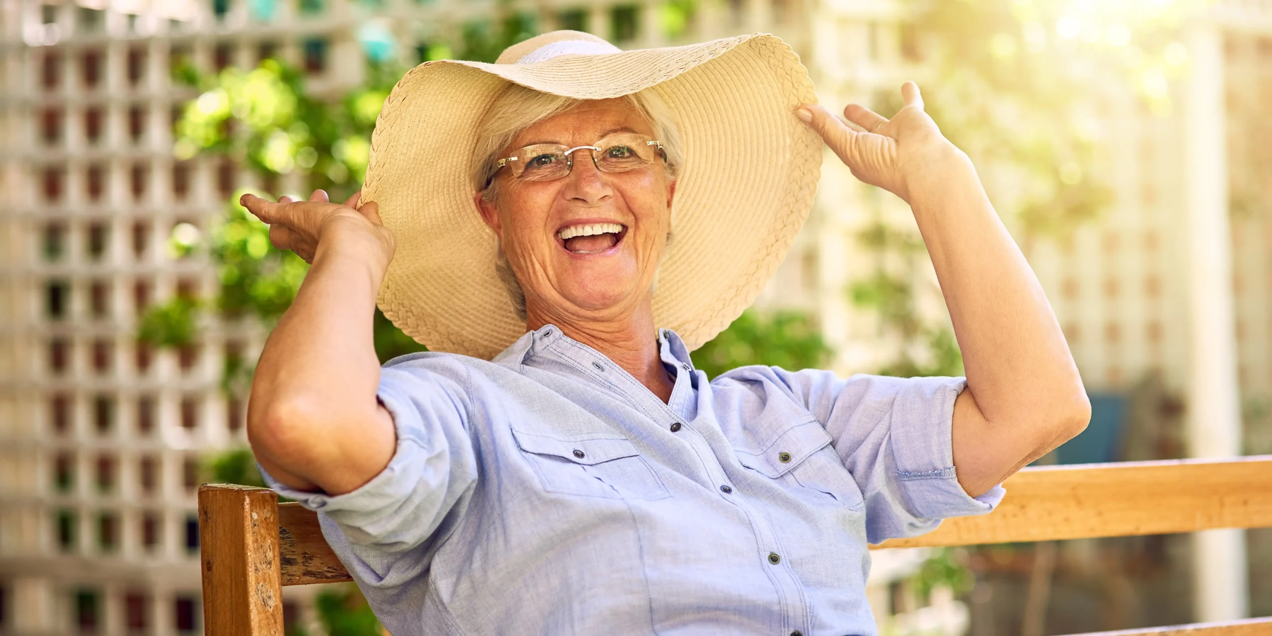 Retired woman wearing hat outside