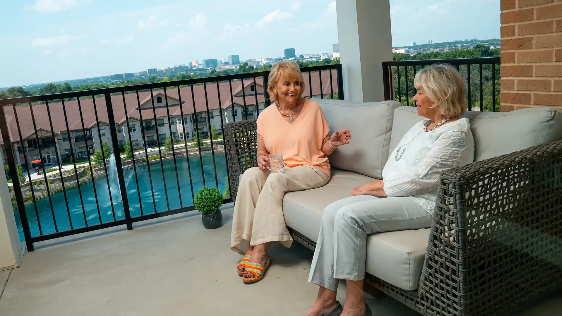 Retired friends sitting on the balcony at PVN